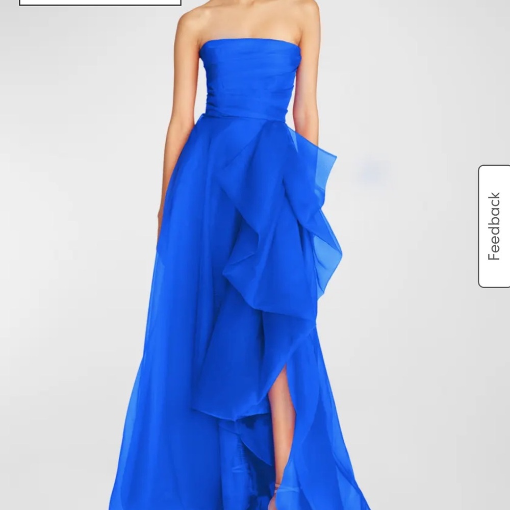 Theia Draped strapless Gown. Blue Strapless Gown with Ruffles and High Slit.